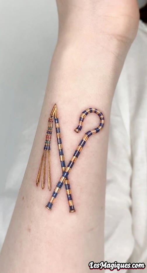 Tatouage escroc et fléau